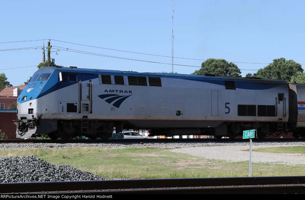 AMTK 5 leads train P092 away from the station